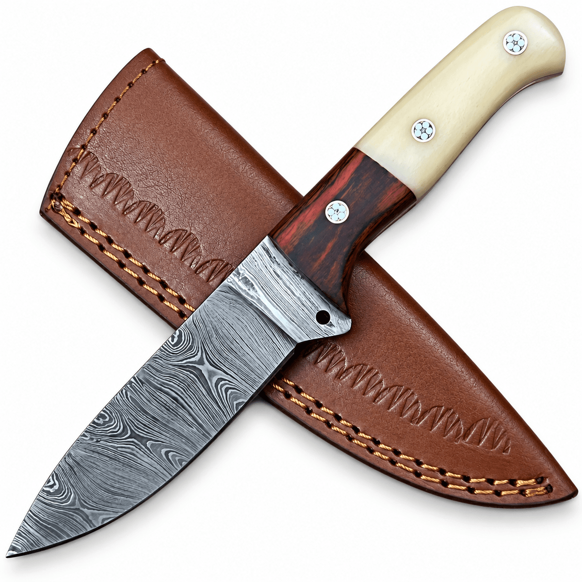 Handmade hunting knife resting on its tooled leather sheath