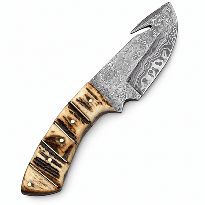 Gut hook hunting knife with Damascus blade and stag horn handle
