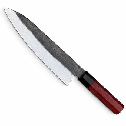Gyuto chef knife with 7-inch black forged 1095 steel blade and polished edge bevel

