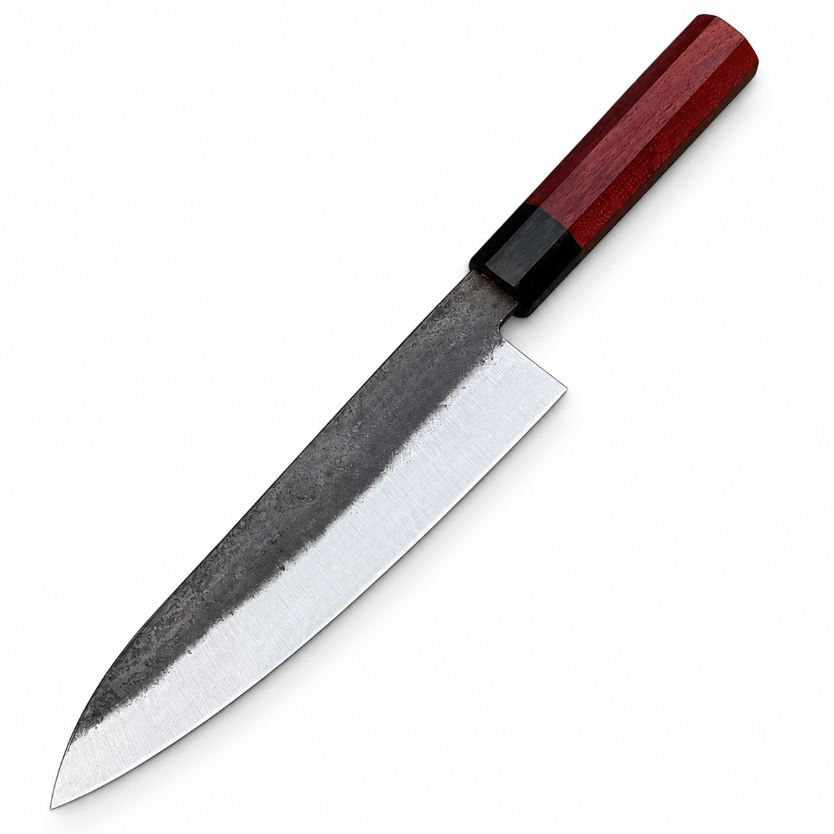 Handmade gyuto knife with dark textured blade on white background
