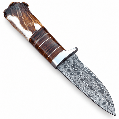 Stag antler crown handle with stacked leather washers and metal spacers
