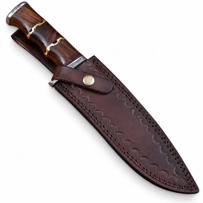 8 inch Bowie knife crossed over its tooled leather sheath with snap strap