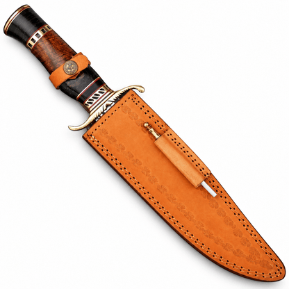 A traditional fixed-blade knife with a dark wood and black handle, brass guard and pommel, shown with its tan leather sheath on a white background.