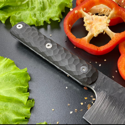 Black G10 knife handle with faceted texture and three silver fasteners
