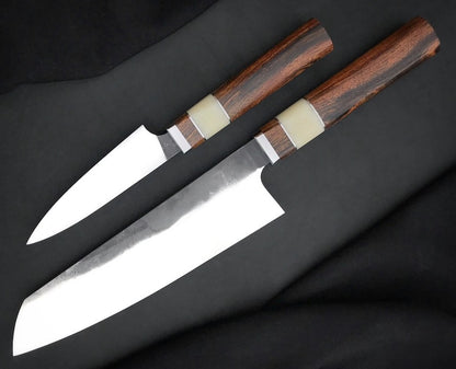 Chef and paring knife set with two handmade 440C knives and octagonal wood handles on black fabric
