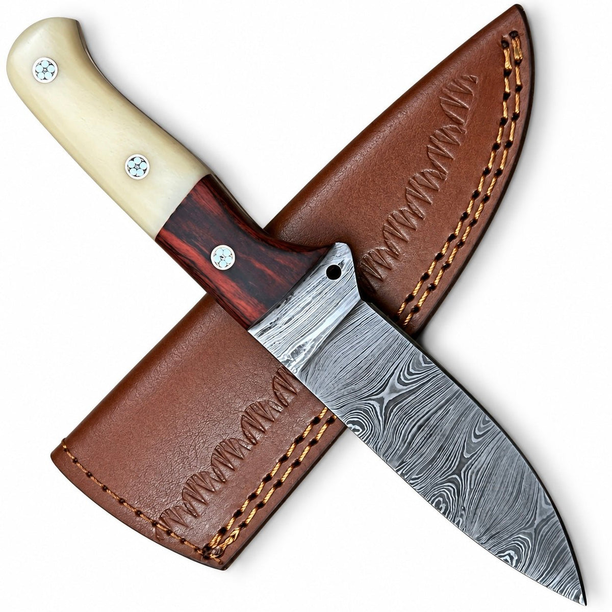 Damascus bolster and wavy layered blade pattern on a hunting knife
