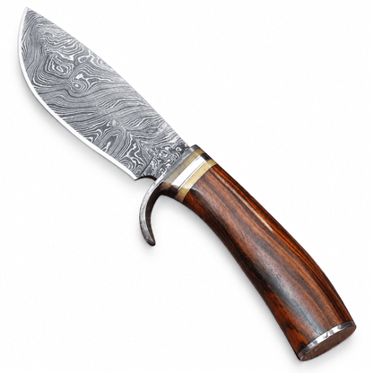 Close view of the layered Damascus pattern on a small Bowie blade
