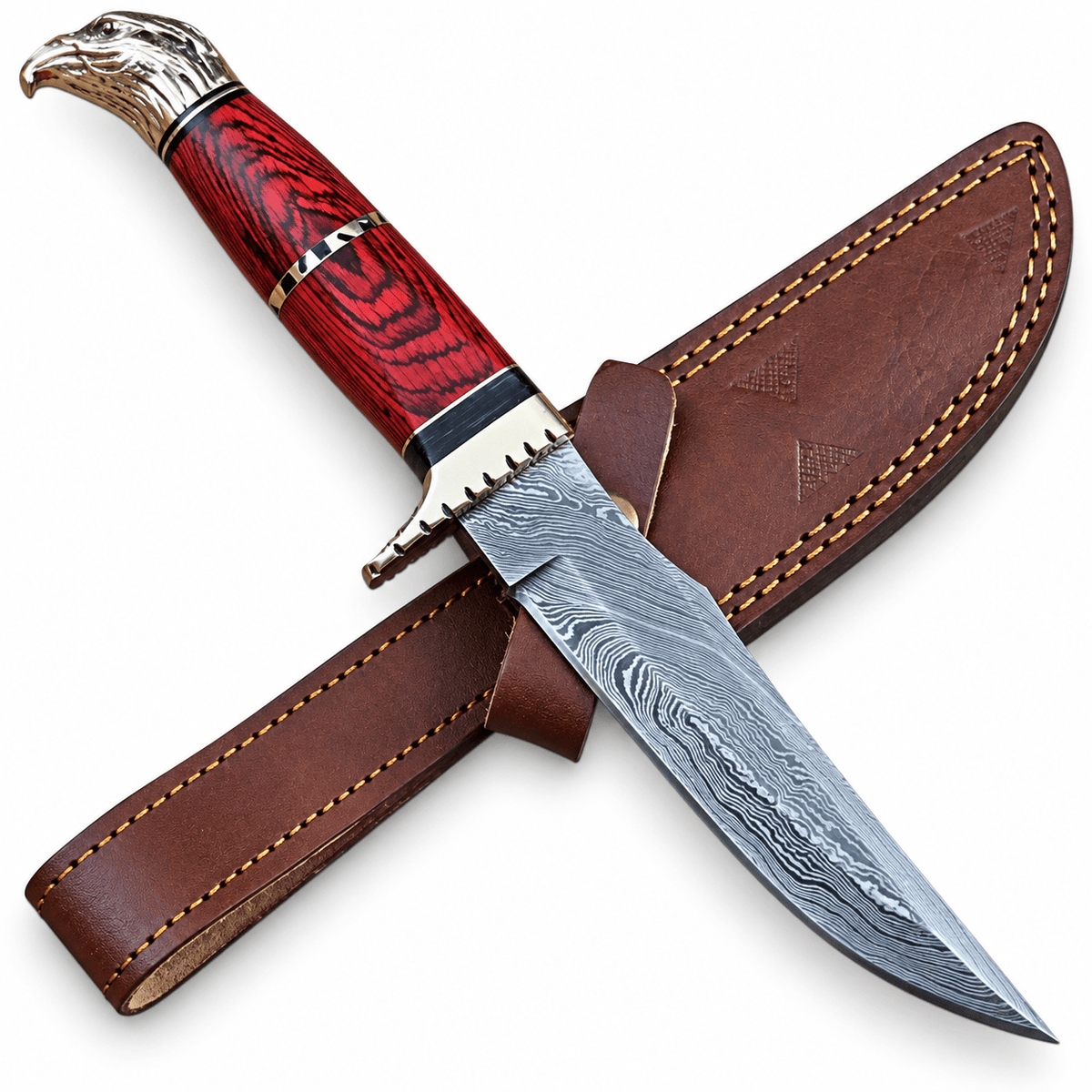 Handmade Damascus knife with eagle head pommel next to its leather sheath