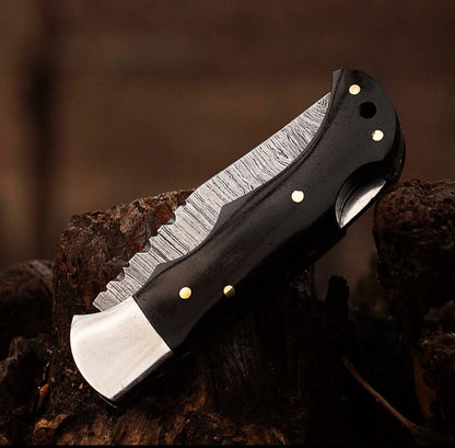 Damascus Steel Folding Knife – Black Horn Handle + Leather Sheath Unique Blades Runner