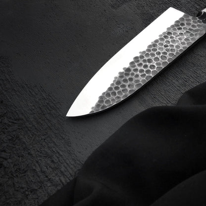 Handmade 7 inch stainless steel kitchen knife with textured hammered blade face
