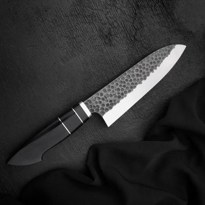 Black Micarta knife handle with two thin light spacers and polished metal collar
