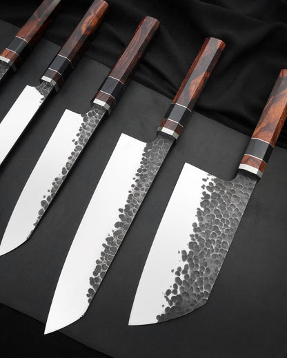 Octagonal wood knife handles with swirled grain, black and light spacers and polished collars
