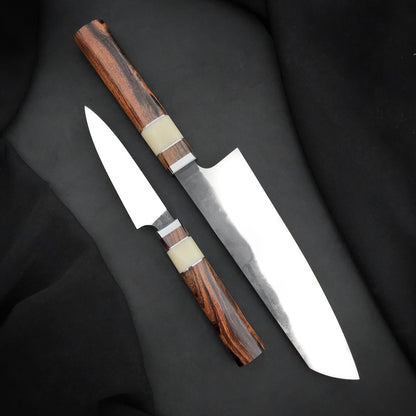 Octagonal wood knife handles with pale accent sections, thin spacers and polished collars
