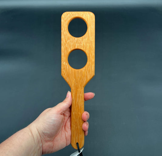 spanking paddle with holes